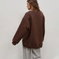 Överdimensionerad enfärgad sweatshirt med rund hals