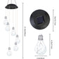 Färgglada LED-solcellsdrivna vindspel med glödlampa